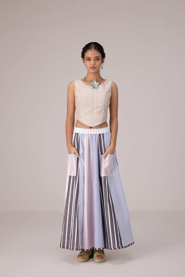 Wrapped jacket with quilted striped corset top paired with cotton polpin skirt