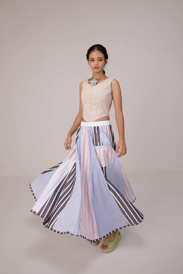 Wrapped jacket with quilted striped corset top paired with cotton polpin skirt