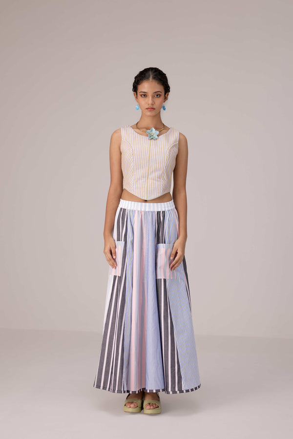 Wrapped jacket with quilted striped corset top paired with cotton polpin skirt