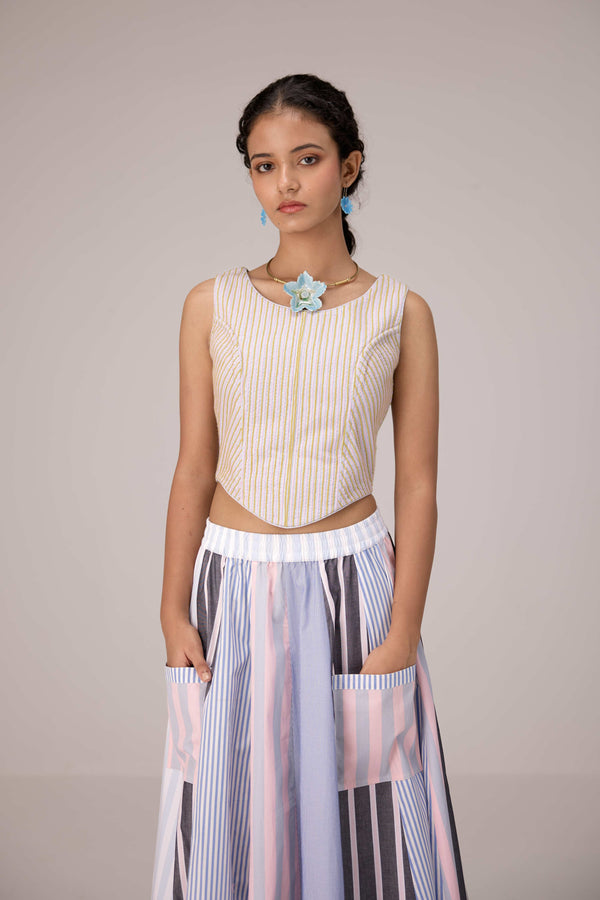 Wrapped jacket with quilted striped corset top paired with cotton polpin skirt