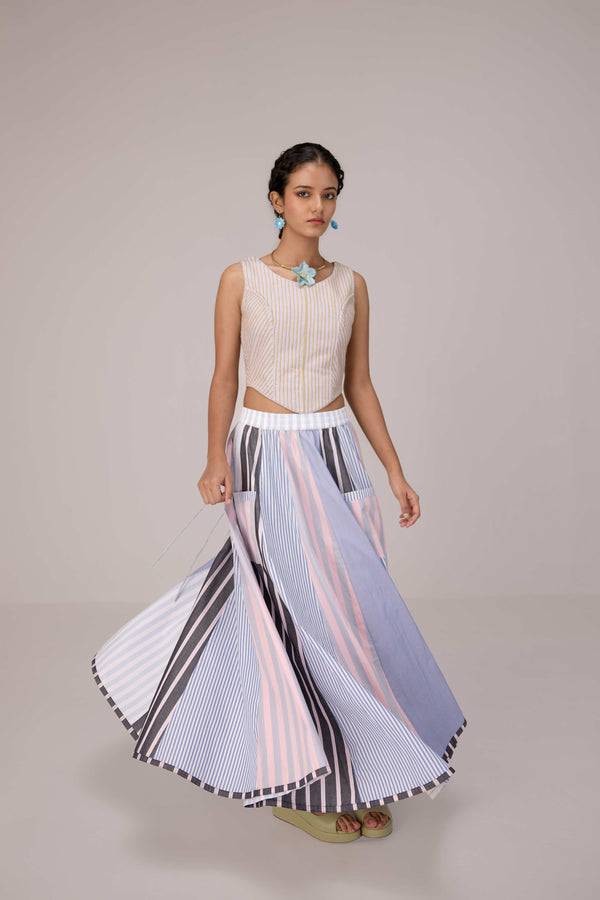 Wrapped jacket with quilted striped corset top paired with cotton polpin skirt