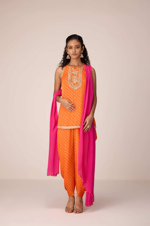 Mustard orange zardozi embroidered top dhoti set.