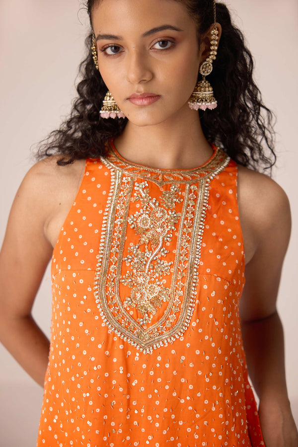 Mustard orange zardozi embroidered top dhoti set.