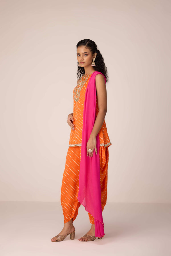 Mustard orange zardozi embroidered top dhoti set.