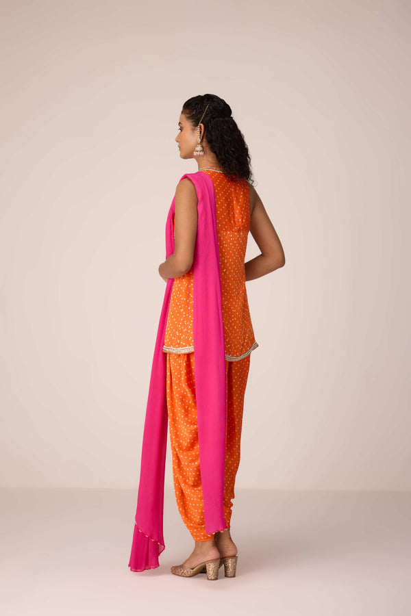 Mustard orange zardozi embroidered top dhoti set.