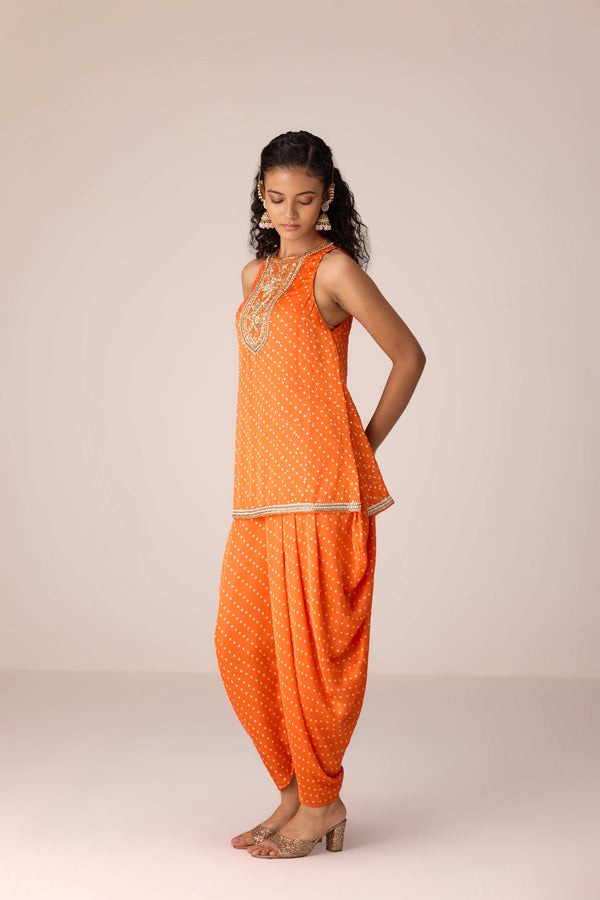 Mustard orange zardozi embroidered top dhoti set.