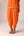 Mustard orange zardozi embroidered top dhoti set.