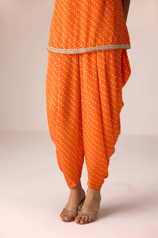 Mustard orange zardozi embroidered top dhoti set.