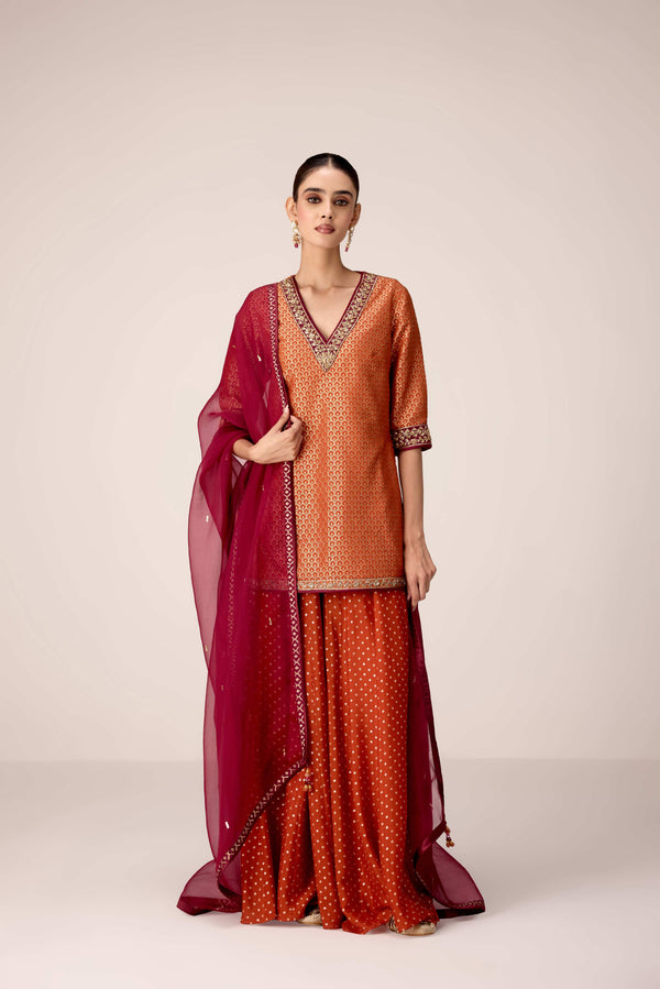 Rust orange zardozi embroidered kurta sharara set