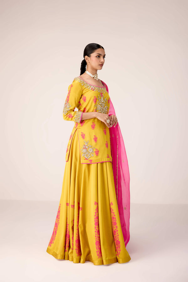 Yellow pink zardozi embroidered top skirt set.