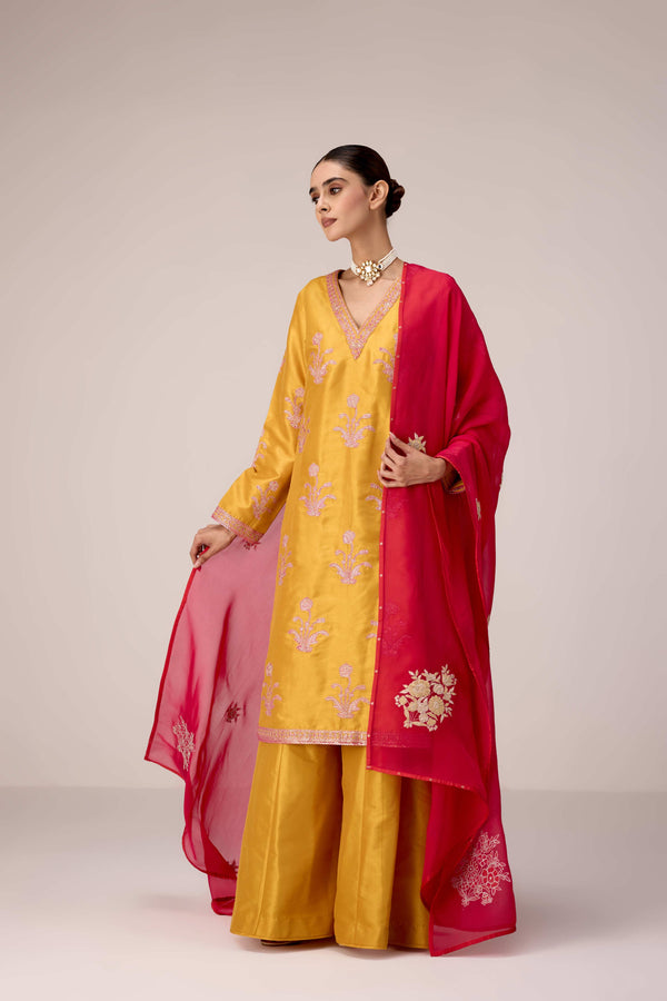 Mustard pink gold patch and thread embroidered kurta pants set.