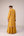 Mustard pink gold patch and thread embroidered kurta pants set.