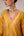 Mustard pink gold patch and thread embroidered kurta pants set.