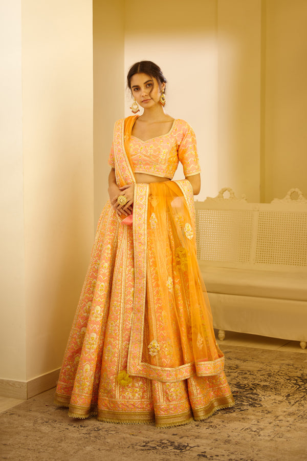 Peach Orange Lehenga Set.