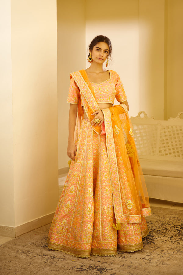 Peach Orange Lehenga Set.