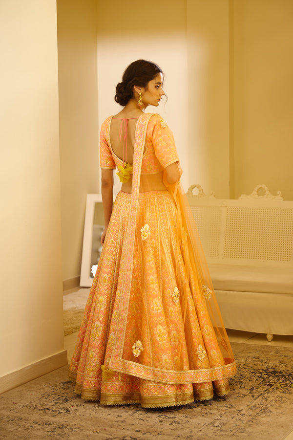 Peach Orange Lehenga Set.