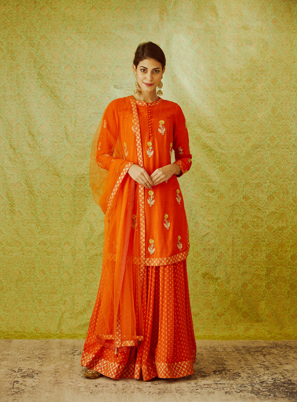 Orange Kurta & Skirt Set.