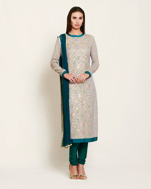 Neutral/teal  kurta set.