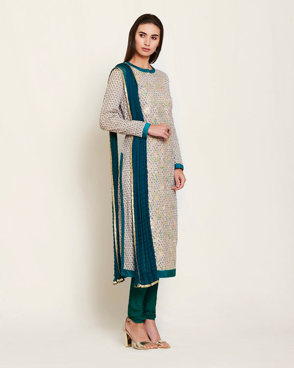 Neutral/teal  kurta set.