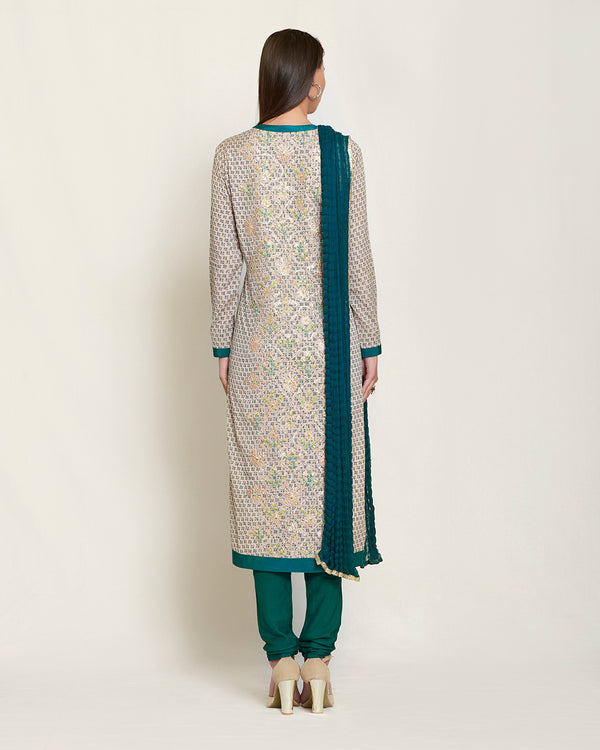 Neutral/teal  kurta set.