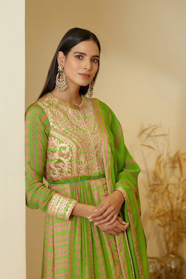 Green Anarkali set.