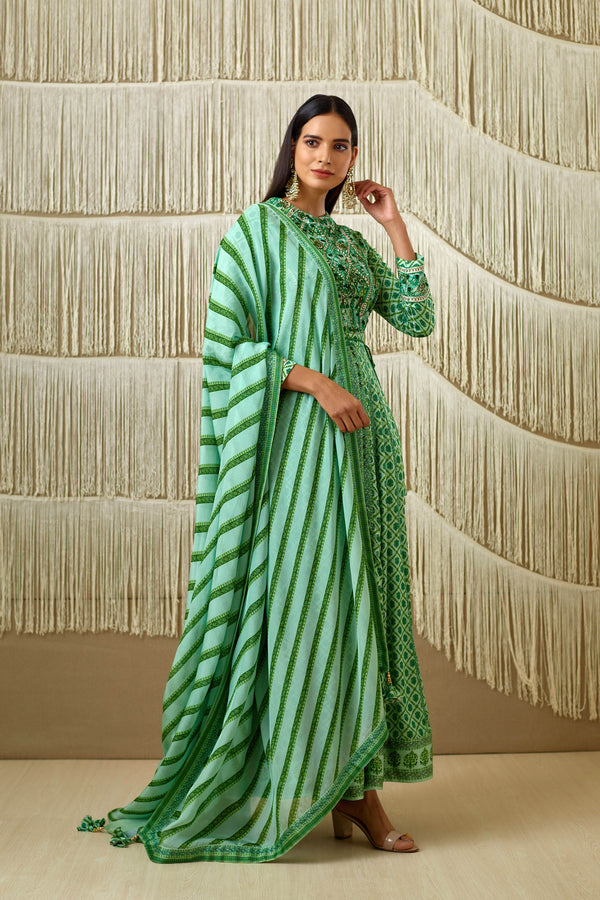 Green Anarkali set.