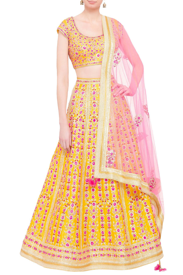 Yellow silk gota work lehenga with pink dupatta